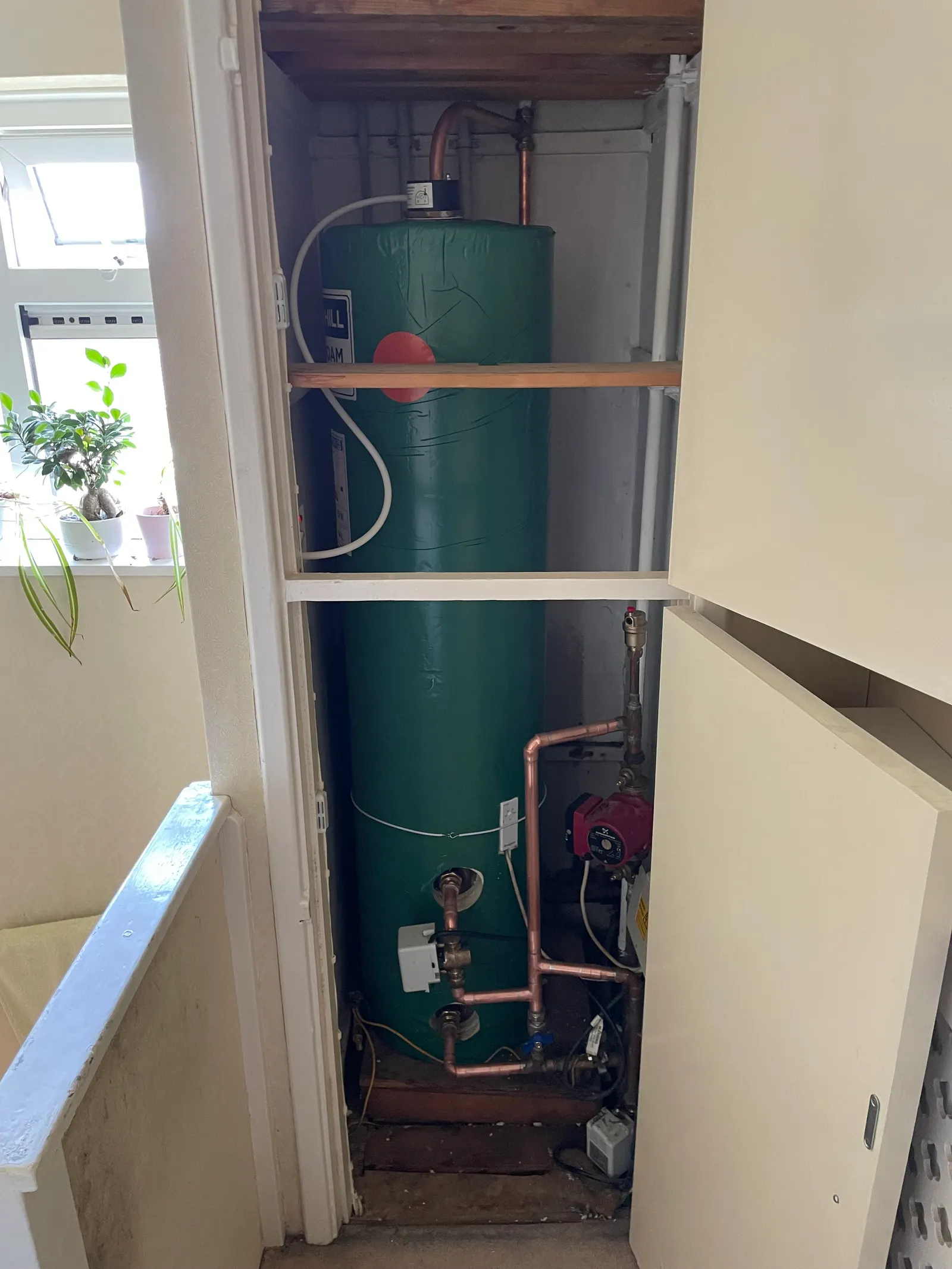 Hot water cylinder and associated copper pipework in one of Pureflo's uploaded projects